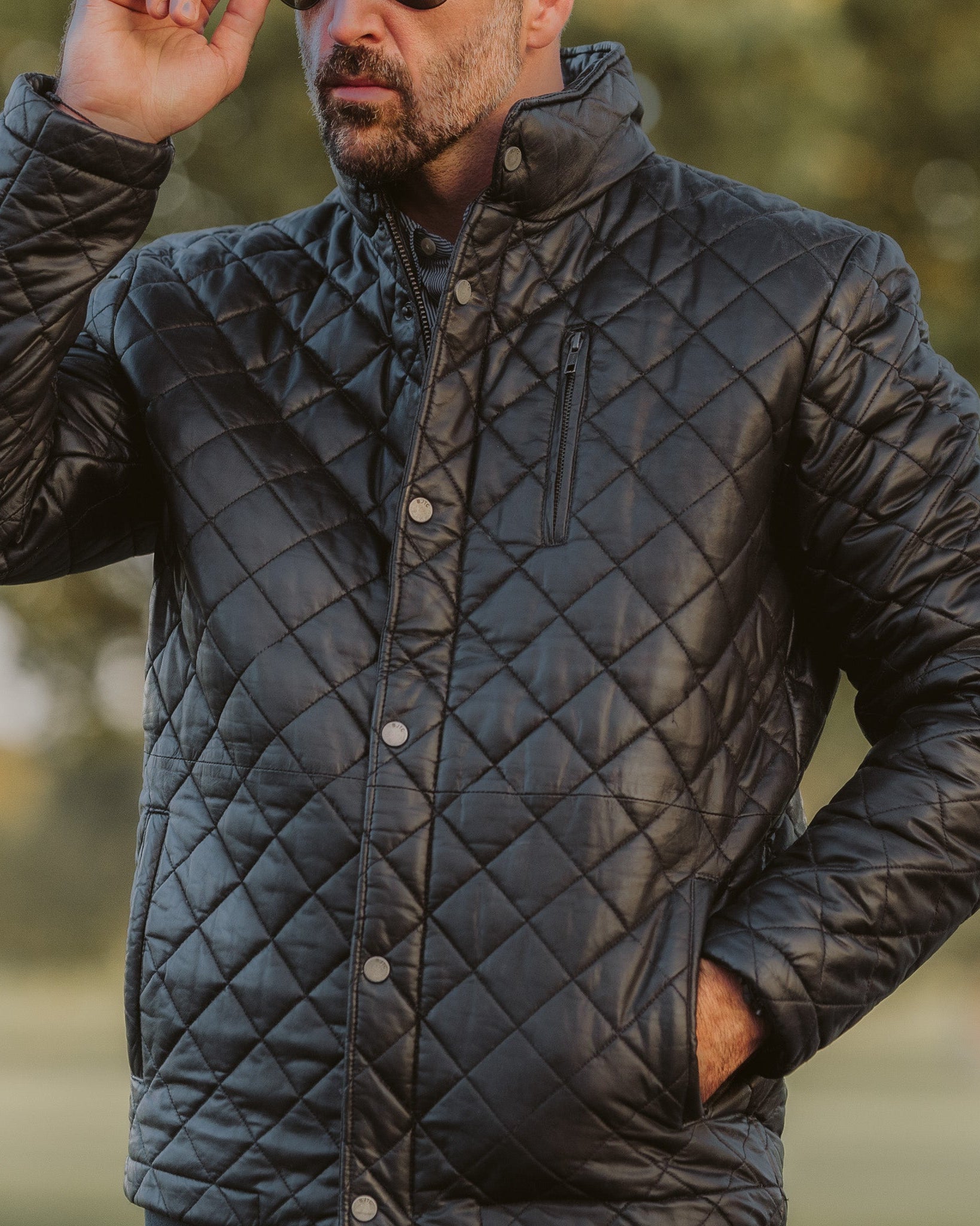 Featuring practical pockets and a secure zipper, the Highlands Quilted Leather Jacket combines functionality with a refined aesthetic.