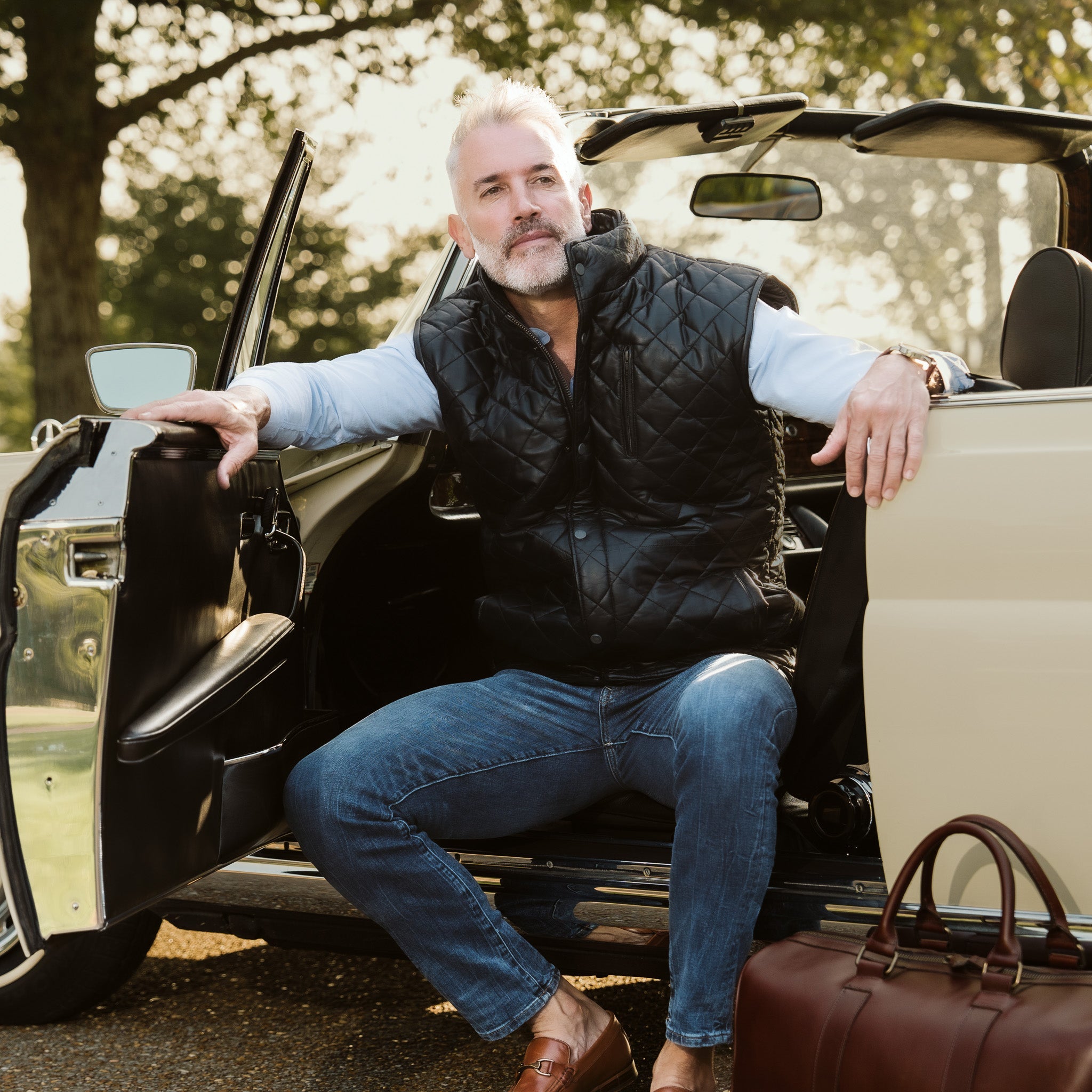 The black quilted leather vest embodies a timeless elegance, perfect for the sophisticated man who values both form and function.